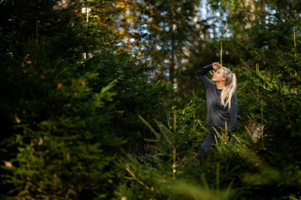 Photo of girl looking at trees