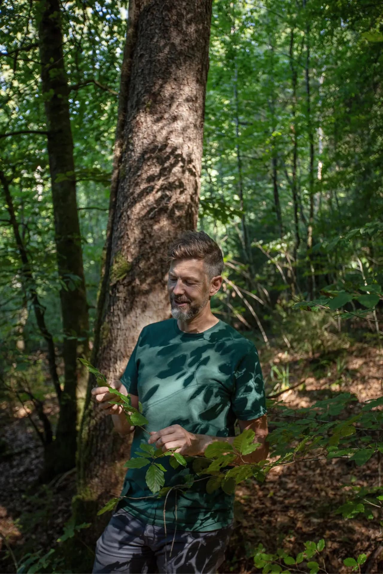 Jodok standing in the forest