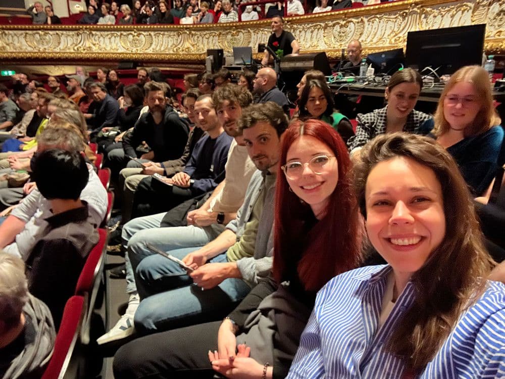 people sitting in a theater